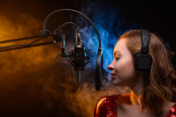 Banner. Vocalist sings in the studio. Practice and school of vocal. Music and teaching. Effective...