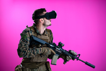 Fototapeta premium soldier in battle using virtual reality glasses