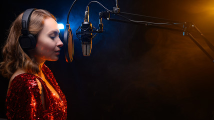 Banner. Vocalist sings in the studio. Practice and school of vocal. Music and teaching. Effective...