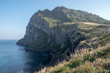 Scenery of Seongsan Ilchulbong inactive volcano with the sea in Juje island, South Korea.