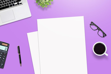 Top view office desk or education desk and blank paper for text and images. isolated on purple background
