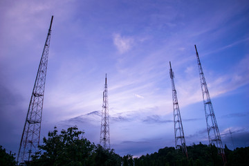 television repeater antenna on morning sky background