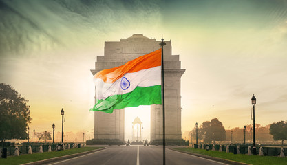 INDIA GATE DELHI WITH INDIA FLAG FLYING - obrazy, fototapety, plakaty