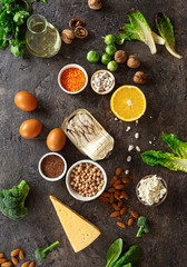 Food sources of omega 3 and healthy fats on dark background top view. Healthy food