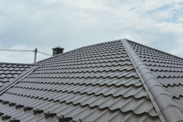 Corrugated metal roof and metal roofing. Modern roof made of met