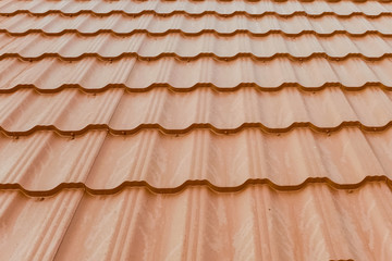 Corrugated metal roof and metal roofing. Modern roof made of met