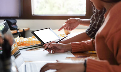 close up businessman hands multitasking man using tablet, laptop and cellphone connecting wifi.	