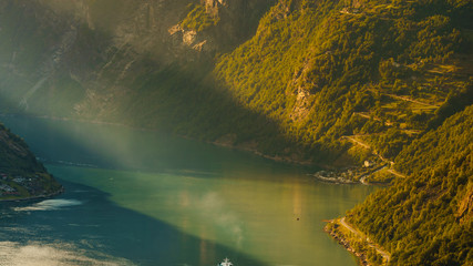 Cruise ship on fjord, Geiranger Norway.