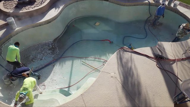 Pool Drain water and Chip Out Construction, Time Lapse,  
in 4K Ultra HD Resolution