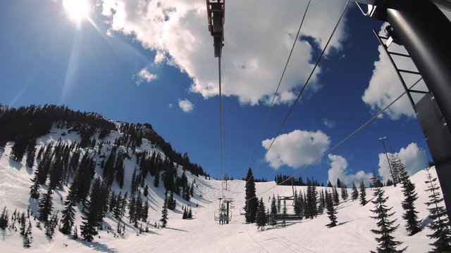 Spring Chairlift Hyperlapse at Ski and Snowboard Resort