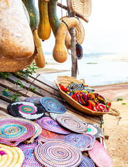 Pumpkins and wicker souvenirs for sale, Morocco. With selective focus.