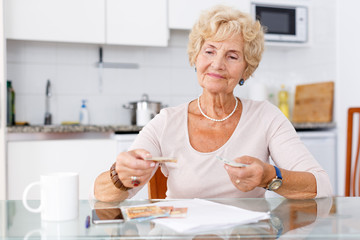 Woman counting her cash