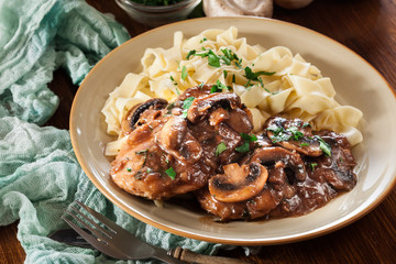 Delicious chicken marsala served with fettucine pasta