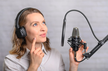 The girl writes a podcast, writes an audiobook, an announcer. The sound of films, cartoons....