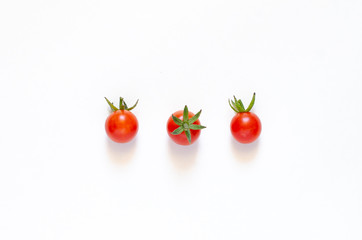 Cherry tomatoes isolated on a white background. Close-up.