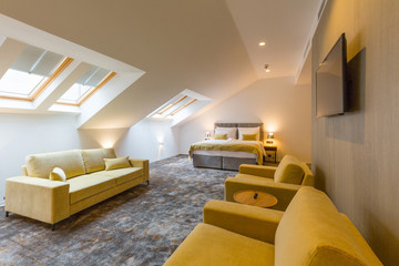 Interior of a loft double bed hotel bedroom