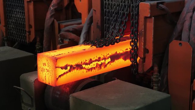 Iron foundry. Continuous casting machine. The exit of steel billets.