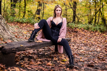 Fashion Portrait in Autumn Woods