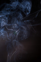 Smoke on a black background.