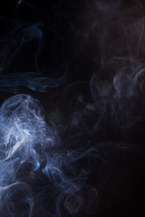 Smoke on a black background.