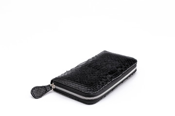 Fashion luxury snakeskin python wallet isolated on a white background.