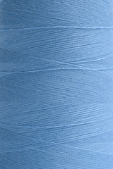 blue threads for sewing close-up, texture