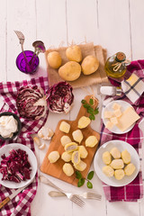 Potato gnocchi stuffed with radicchio and ricotta.