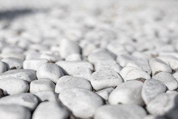 Beach with white and gray stones softly rounded