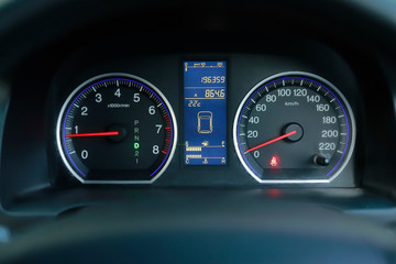 Fototapeta premium car speed meter dashboard and cockpit, close up.
