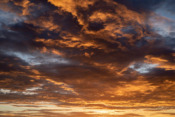 Sunset / sunrise dramatic sky with dark clouds with atmospheric effect