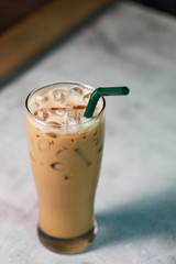 Latte iced coffee fresh drink in the glass put on the table, Coffee cream and sweet drink on summer 