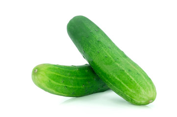 Close-up of whole cucumbers fresh green isolated on white background.
