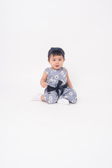 Adorable Asian baby girl is portrait on white background