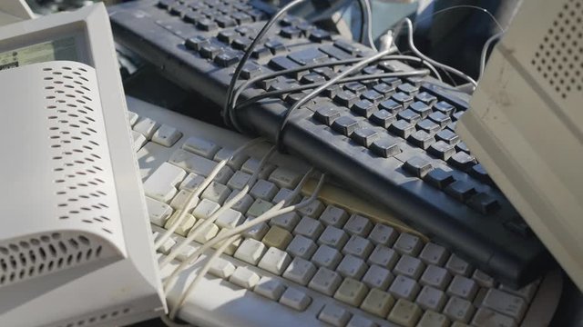 Old computer, electronic and keyboard waste,  Container for old computer and electronic waste