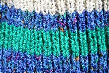 Handmade knitted fabric colored wool background texture