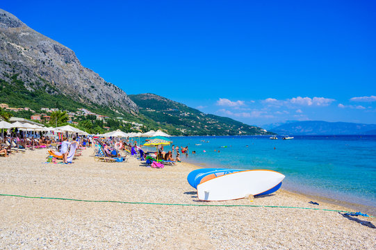 Barbati Beach with crystal clear azure water in beautiful landscape scenery - paradise coastline of Corfu island, Ionian archipelago, Greece.