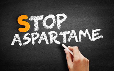 Stop Aspartame text on blackboard, medical concept background