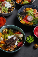 Juicy healthy food in large bowls