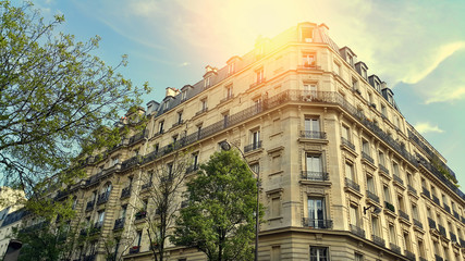 Facade of typical building with attic in Paris