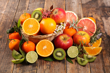 assorted of fruit, orange- kiwi-lemon- grapefruit and apple