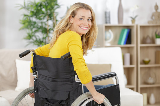 happy disabled woman at home