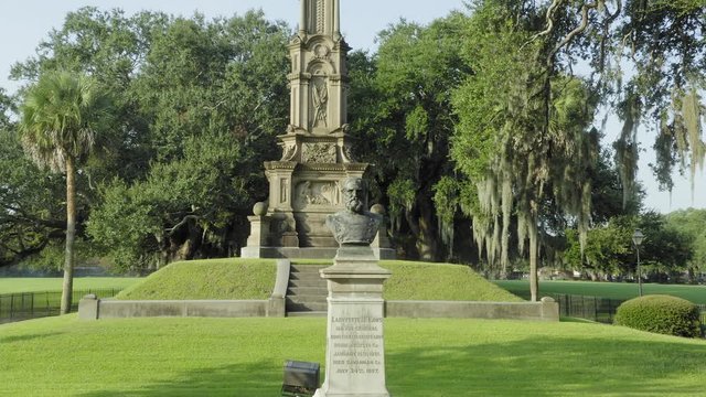 Aerial: Monument sculpture in Forsyth Park.  Savannah, Georgia, USA. 8 August 2019