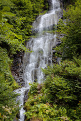 Beautiful waterfall among the mountains in Abkhazia