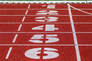 Red running sport track background and texture. Sport running track concept.