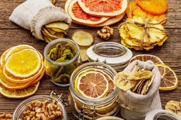 Zero waste food shopping concept. Assortment of dried fruits, walnuts. Sustainable lifestyle