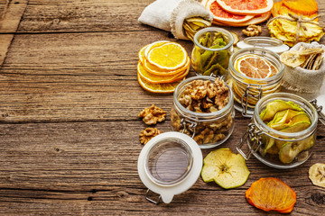 Zero waste food shopping concept. Assortment of dried fruits, walnuts. Sustainable lifestyle
