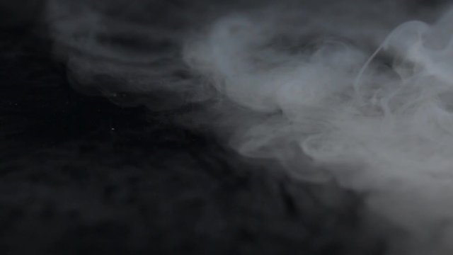 dry ice evaporation on a black background