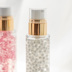 Skincare serum and make-up primer gel bottle, moisturizing lotion and lifting cream emulsion,...