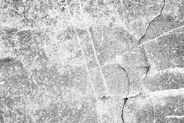 Texture of a concrete wall with cracks and scratches which can be used as a background