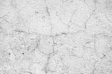 Texture of a concrete wall with cracks and scratches which can be used as a background